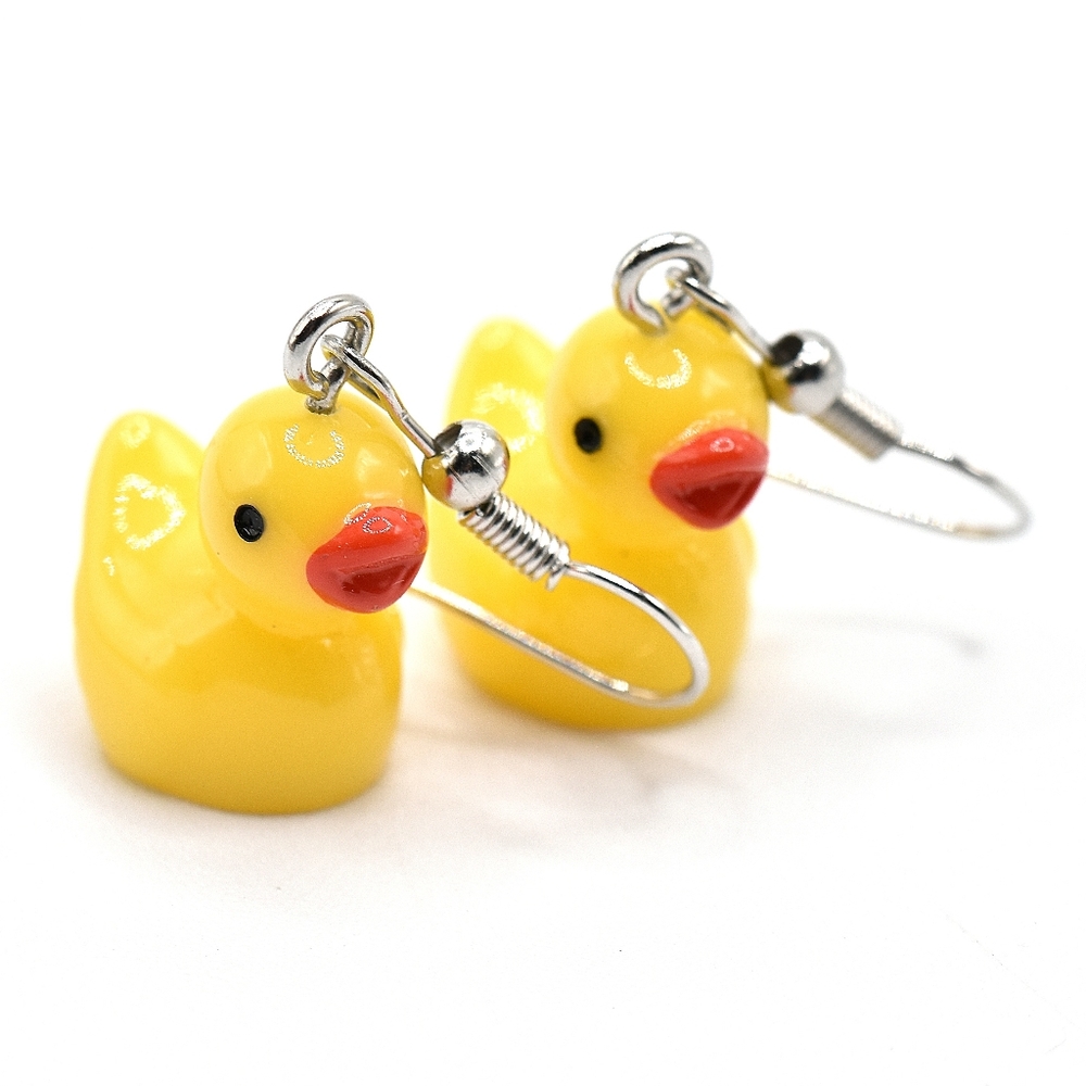 beautiful and lightweight duck earrings, new, silver tone
